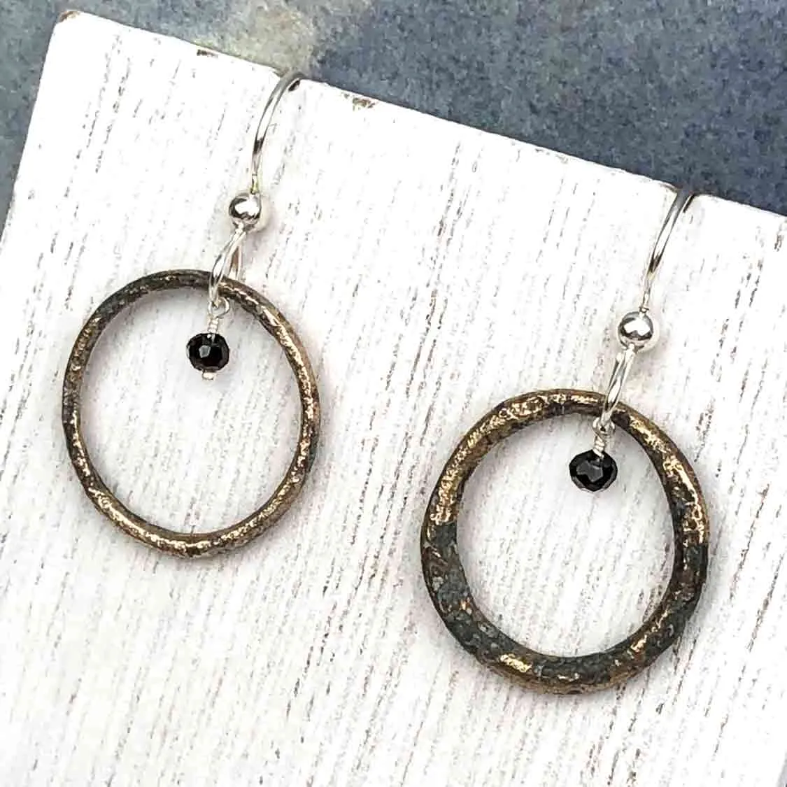 Dark Charcoal Flecked Bronze Celtic Ring Money Earrings with Genuine Blue Sapphire | Artifact #6559