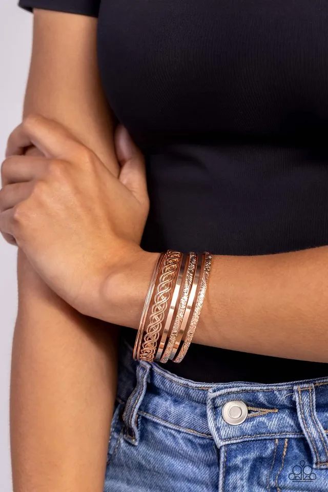 Paparazzi Bracelet ~ Stockpiled Shimmer - Rose Gold