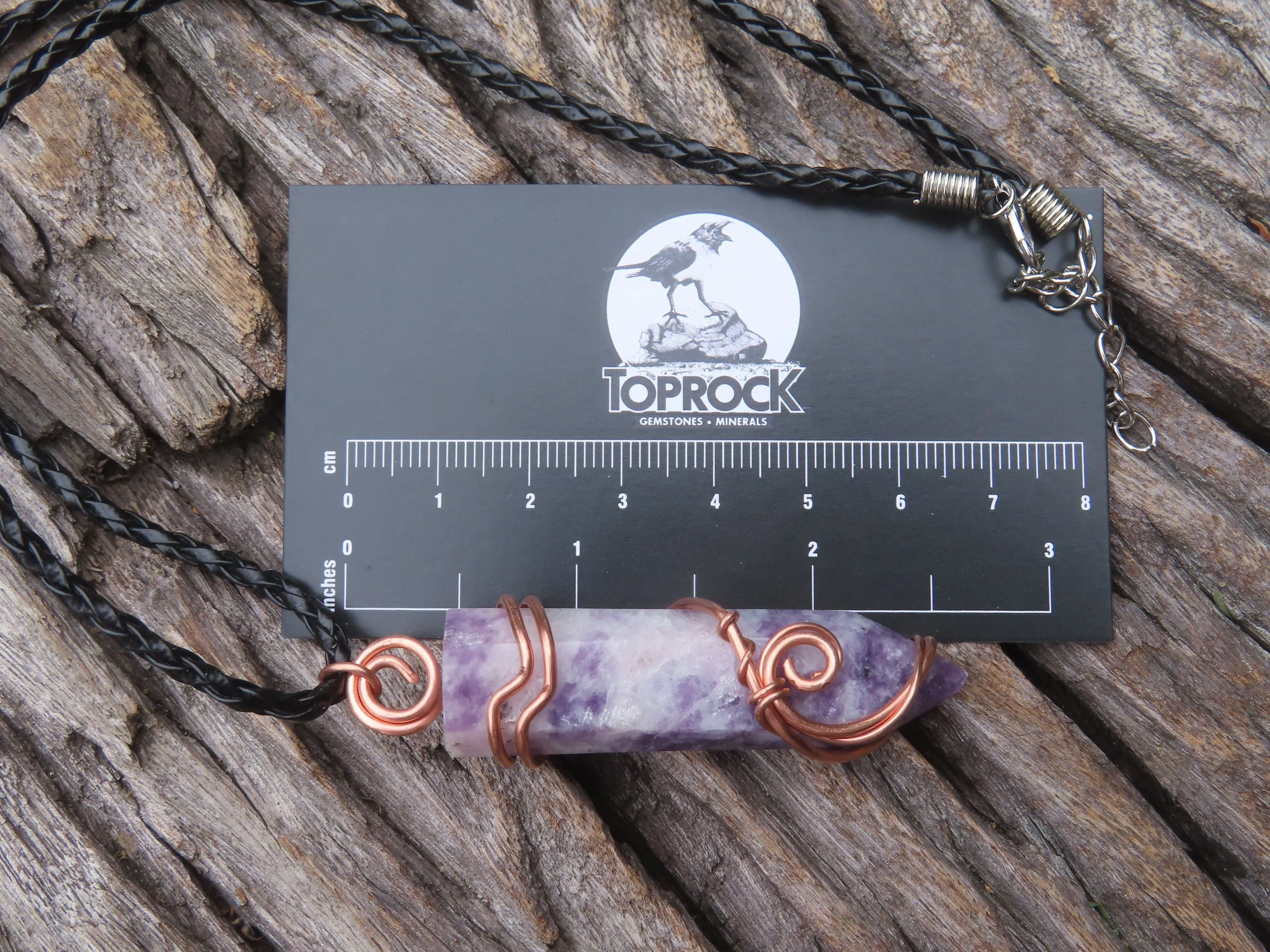 Polished Lepidolite Crystal In Copper Art Wire Wrap With Thong - sold per piece From Zimbabwe