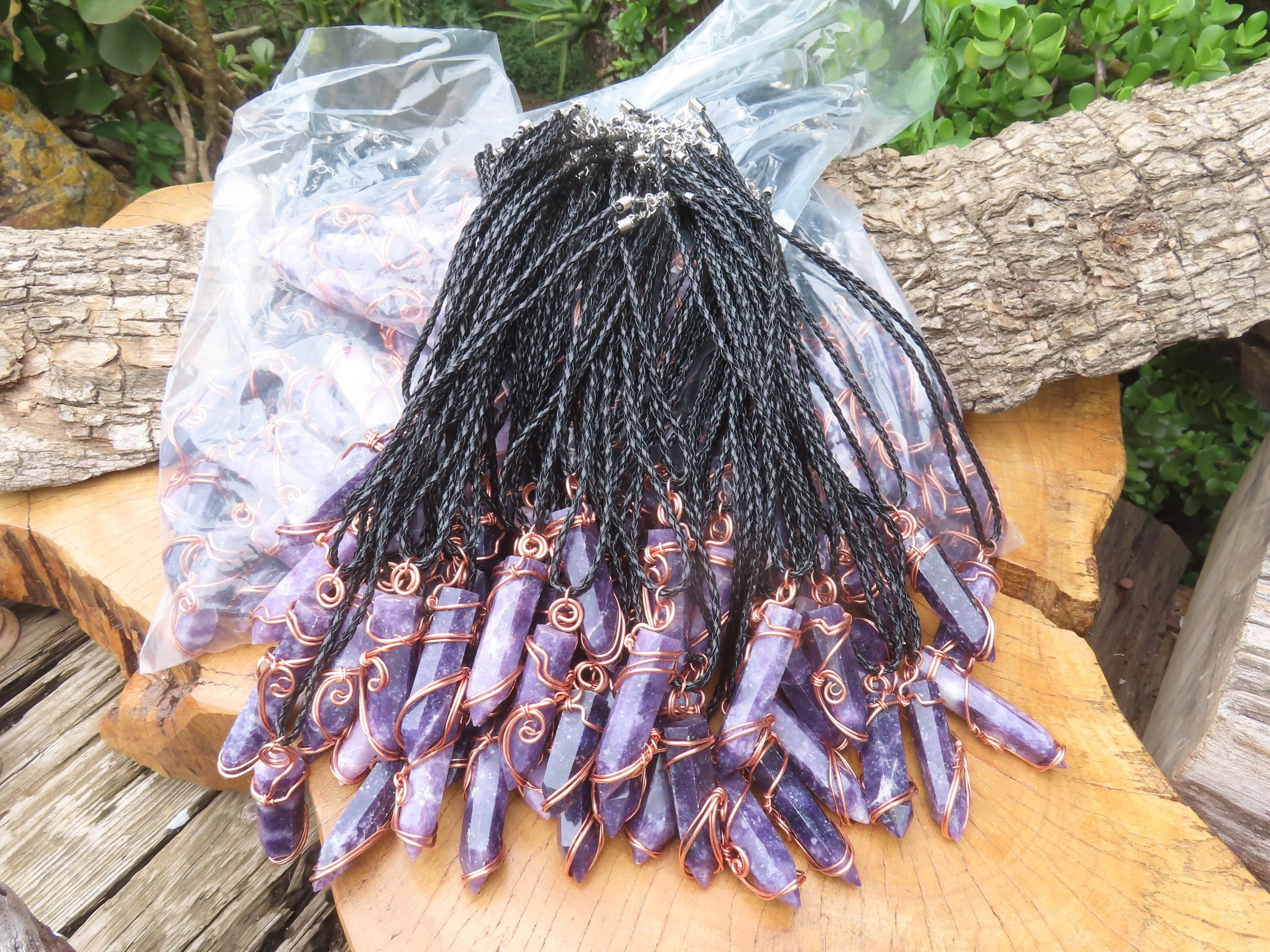 Polished Lepidolite Crystal In Copper Art Wire Wrap With Thong - sold per piece From Zimbabwe