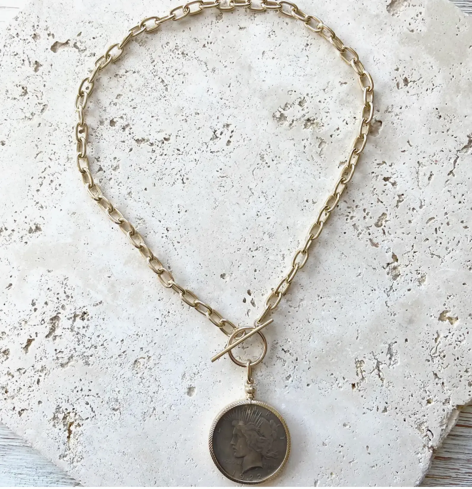 The Peace Coin medallion statement necklaces with toggle