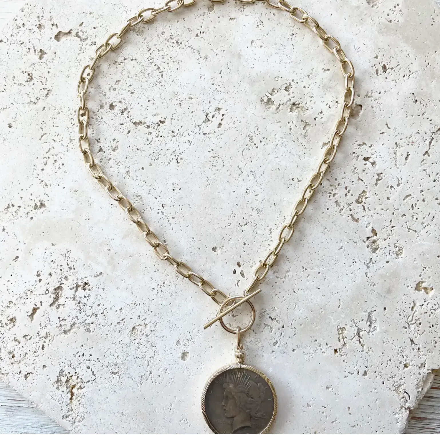 The Peace Coin medallion statement necklaces with toggle