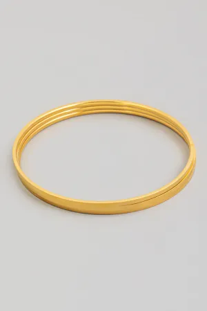 Three Separate Thin Bangles in Gold