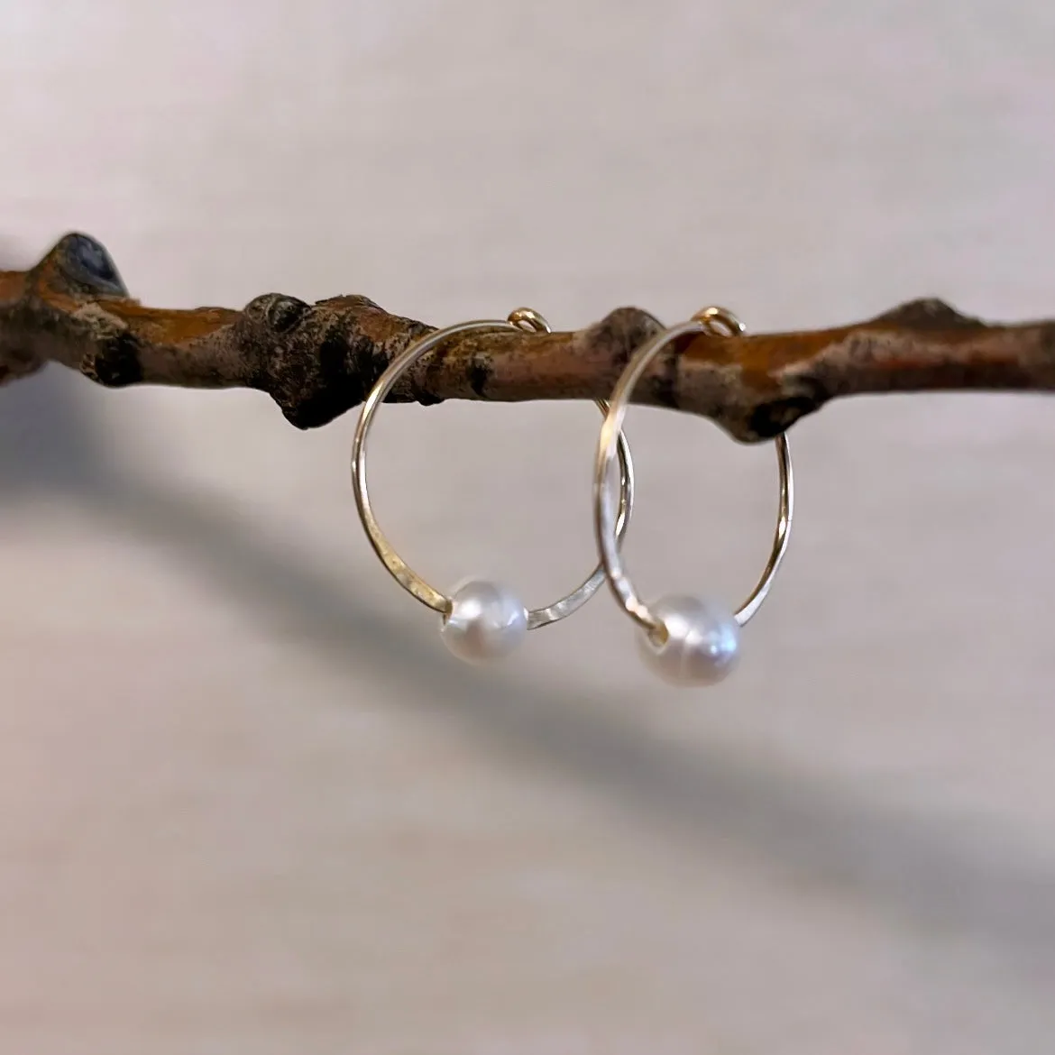 Tiny white Pearl hoops