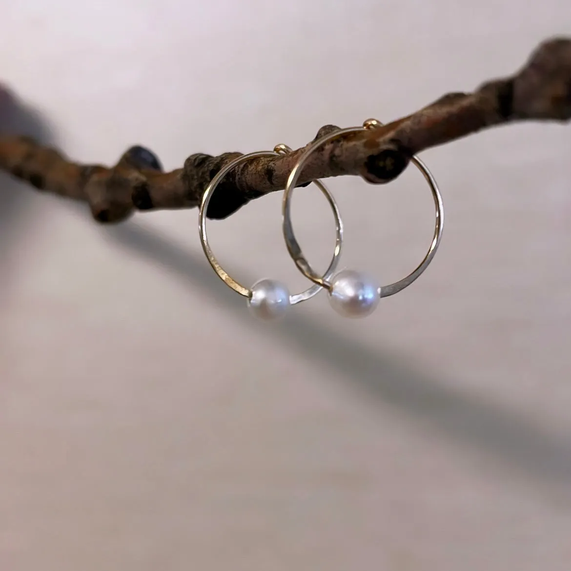 Tiny white Pearl hoops